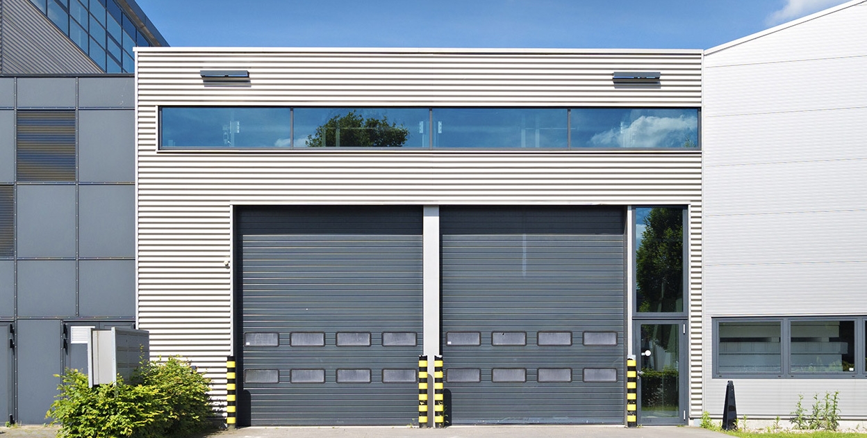 Industrial Doors installed on a modern commercial building in Sussex