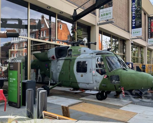 Helicopter going through h automatic sliding doors at the National Army Museum, London